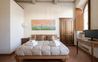 Camera da letto matrimoniale king size con arco in pietra - Suite King Corte del Re Arezzo