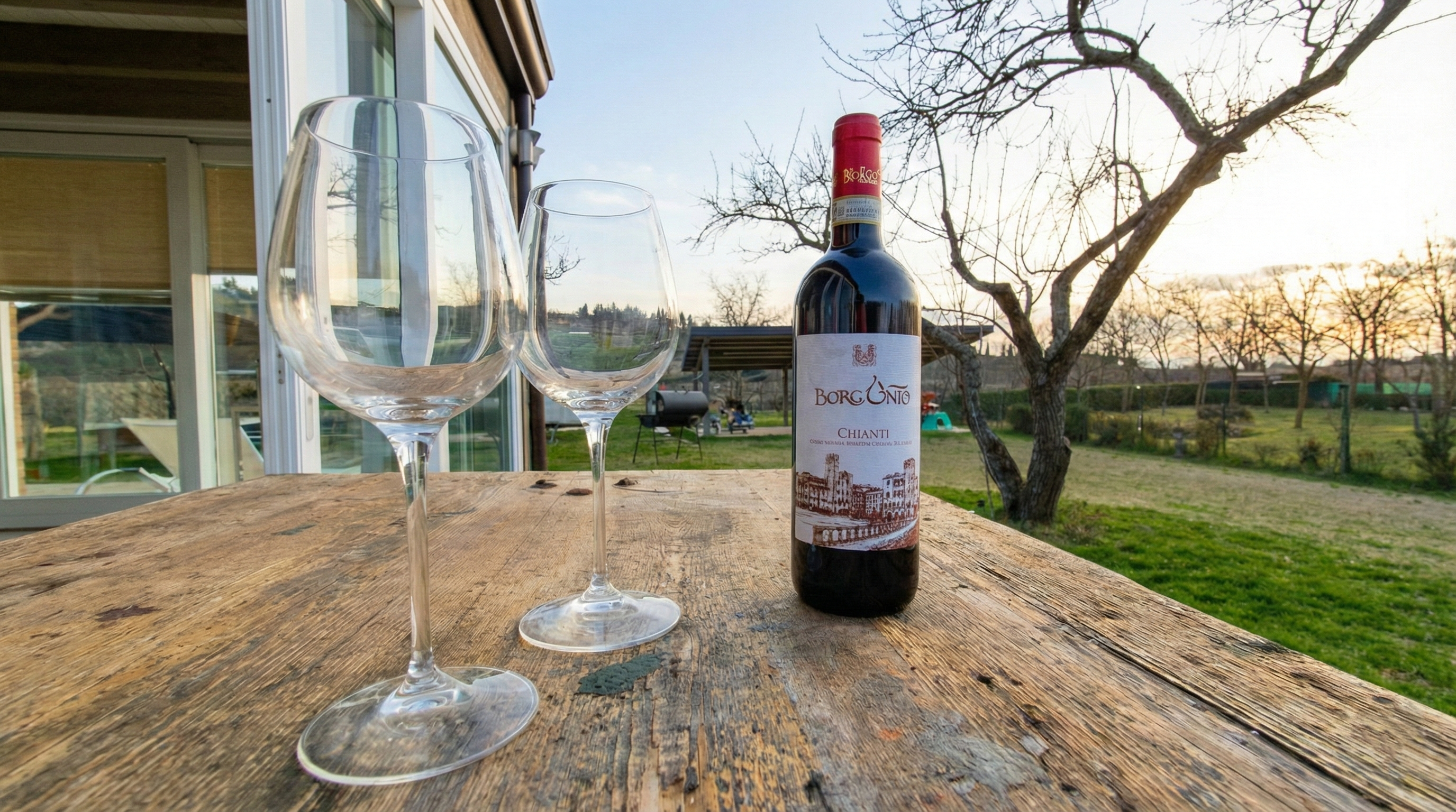 bungalow-rosmarino-vino-tramonto-terrazza.png Degustazione vino al tramonto Bungalow Rosmarino - Viovillas Agricamping Arezzo